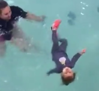  Watch a 2 year old at Houston Swim Club in Sugar Land pass her float test! 