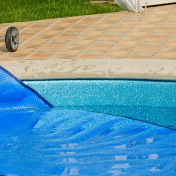 I had slipped under the pool cover at a friend's house...